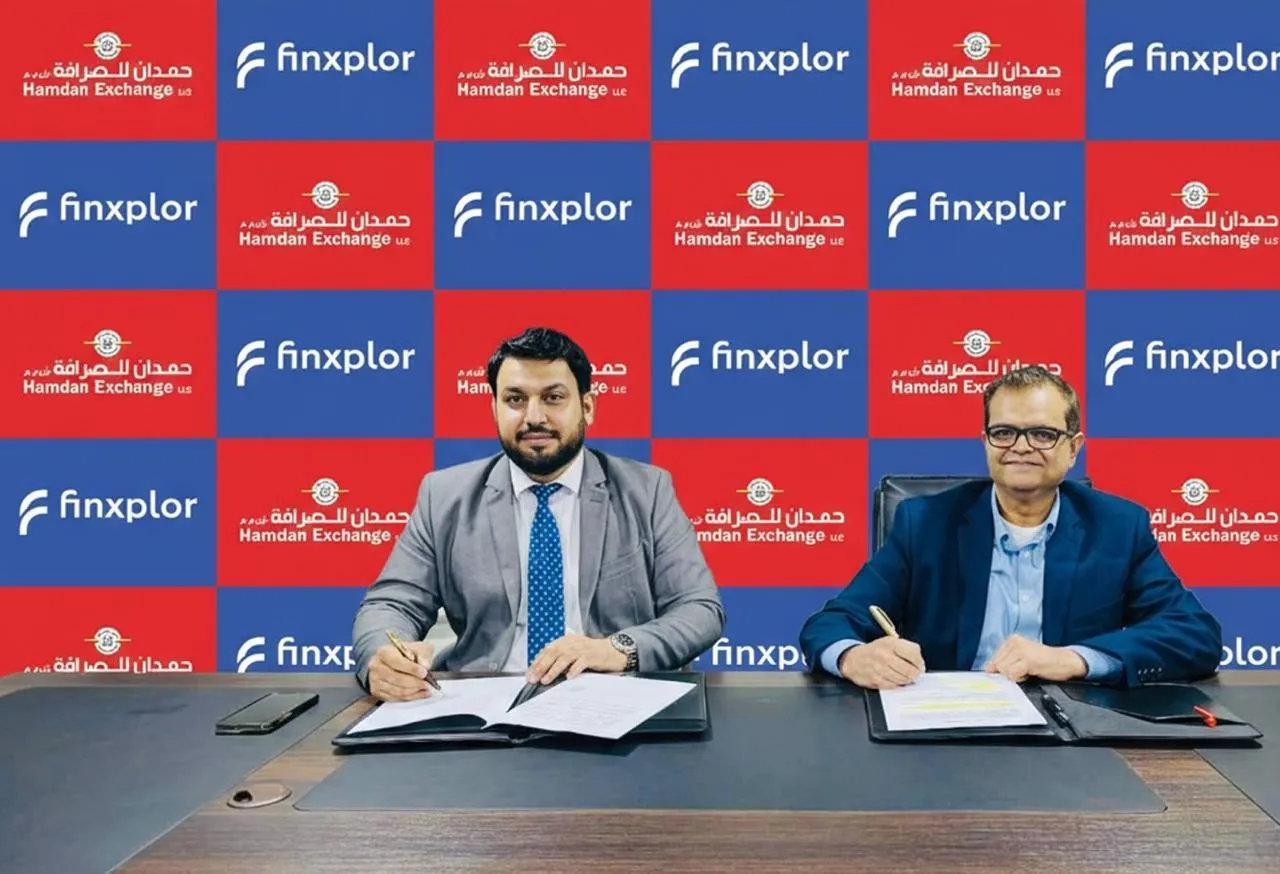 Finxplor and Hamdan Exchange representatives signing