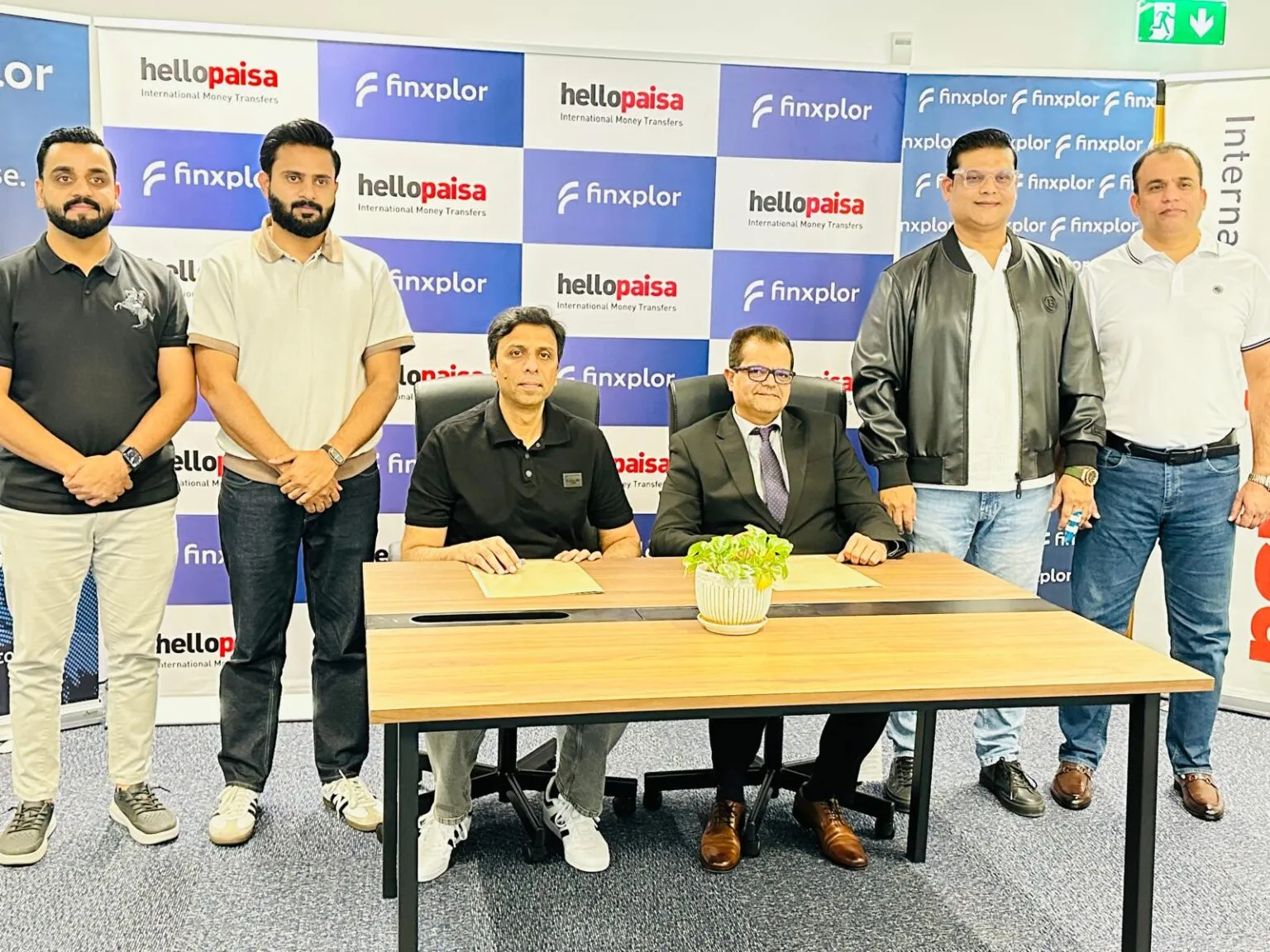 Both teams at the HelloPaisa signing